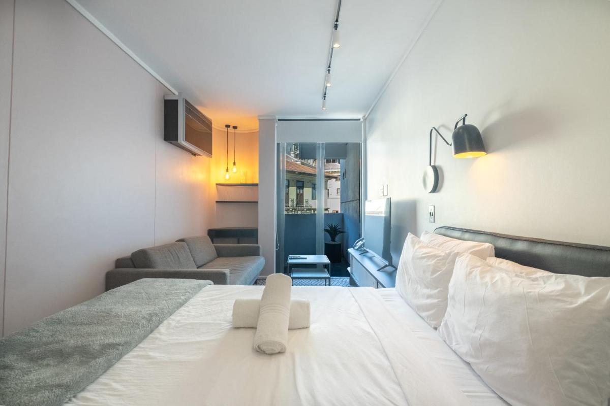 Flamingo 104: Modern Studio Unit with Balcony - Housity