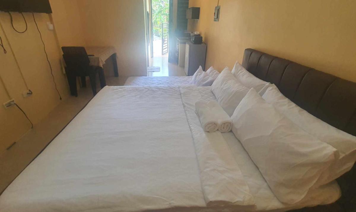 Lucena Meg's Studio Apmnt Deluxe rm-Near SM-Wifi - Housity