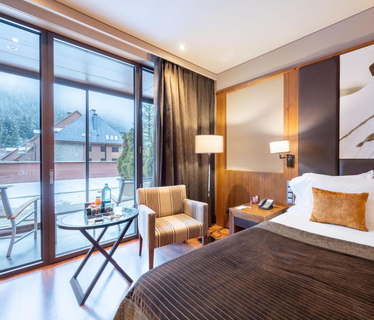 Zona de estar de Hotel Val de Neu G.L.