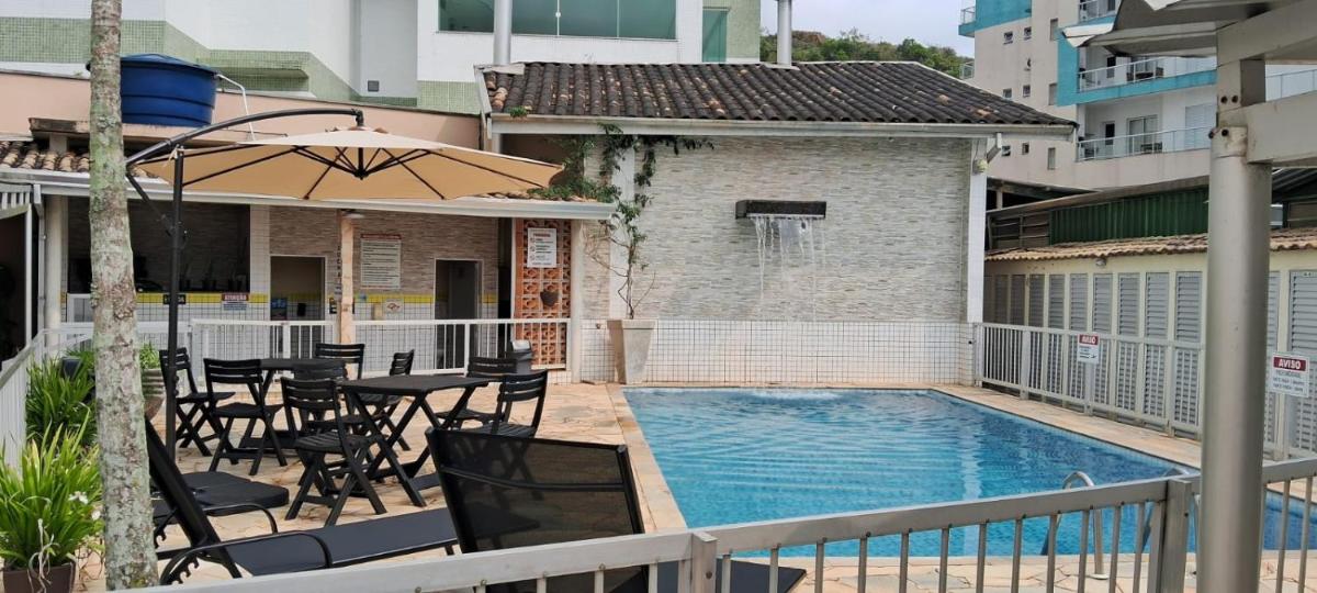 Apto 22E ar condicionado e ventilador, 2 quartos, churrasqueira, elevador e piscina - Housity