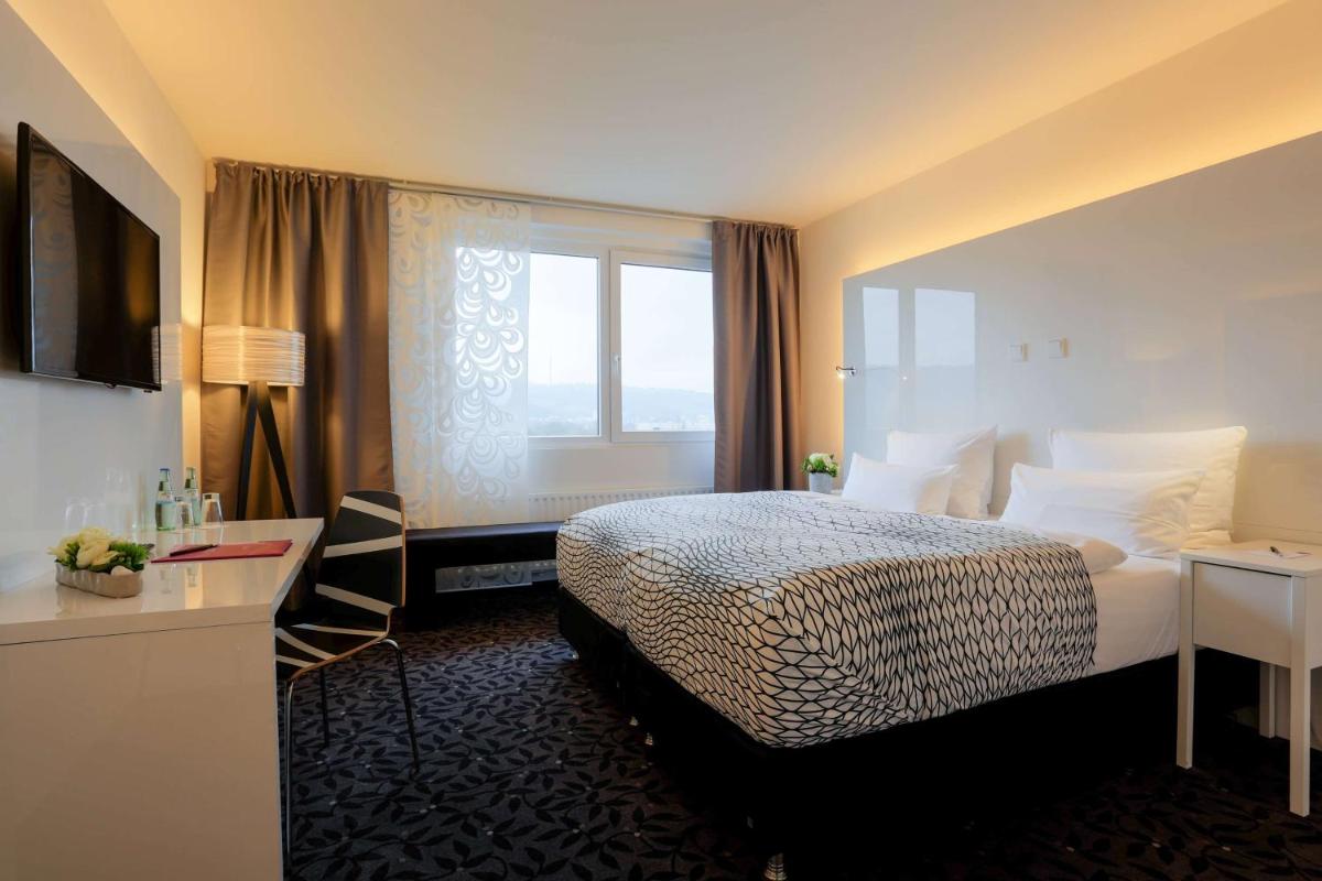 FourSide Plaza Hotel Trier, Trademark Collection by Wyndham - Housity