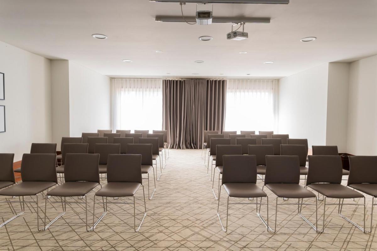 A área empresarial e/ ou a sala de conferências de Gaia Residence