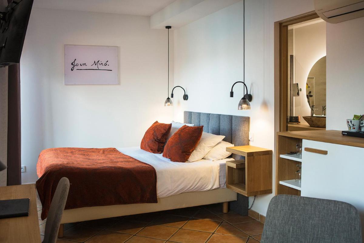 Un ou plusieurs lits dans un hébergement de l'établissement Le Relais Des Trois Mas