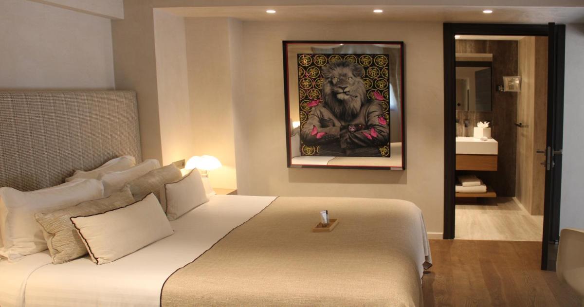 Un ou plusieurs lits dans un hébergement de l'établissement Villa Cosy, hotel & spa