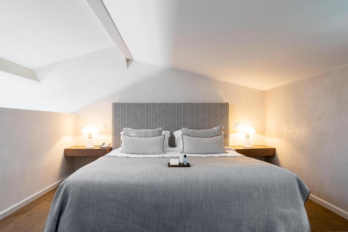 Un ou plusieurs lits dans un hébergement de l'établissement Villa Cosy, hotel & spa