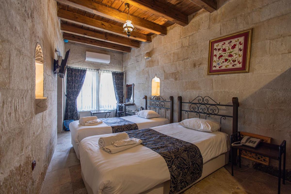 Century Cave Hotel - Housity
