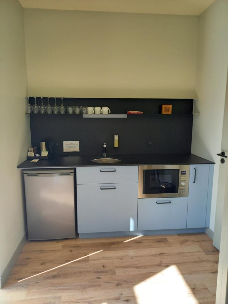Cuisine ou kitchenette dans l'établissement La Maison Rabelais