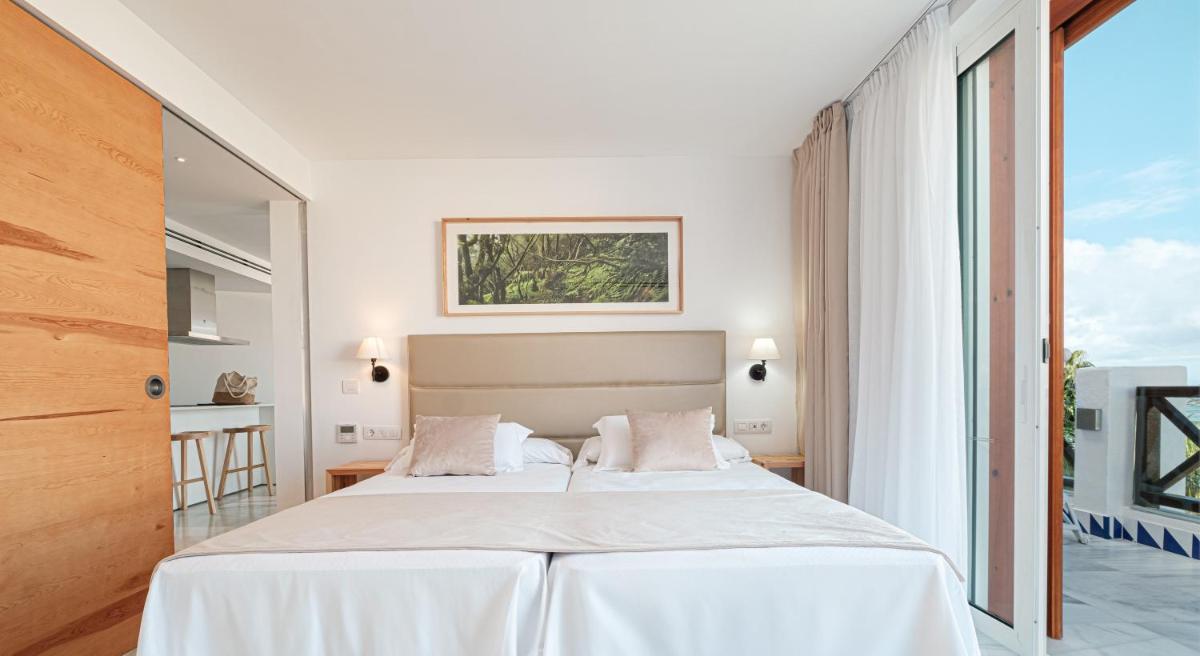 Cama o camas de una habitación en Parque Santiago III Official