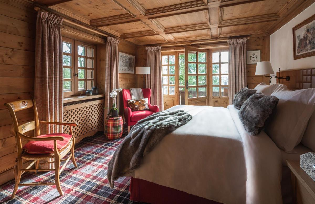 Un ou plusieurs lits dans un hébergement de l'établissement Les Chalets du Mont d'Arbois & Spa, Megève Un ou plusieurs lits dans un hébergement de l'établissement Les Chalets du Mont d'Arbois & Spa, Megève