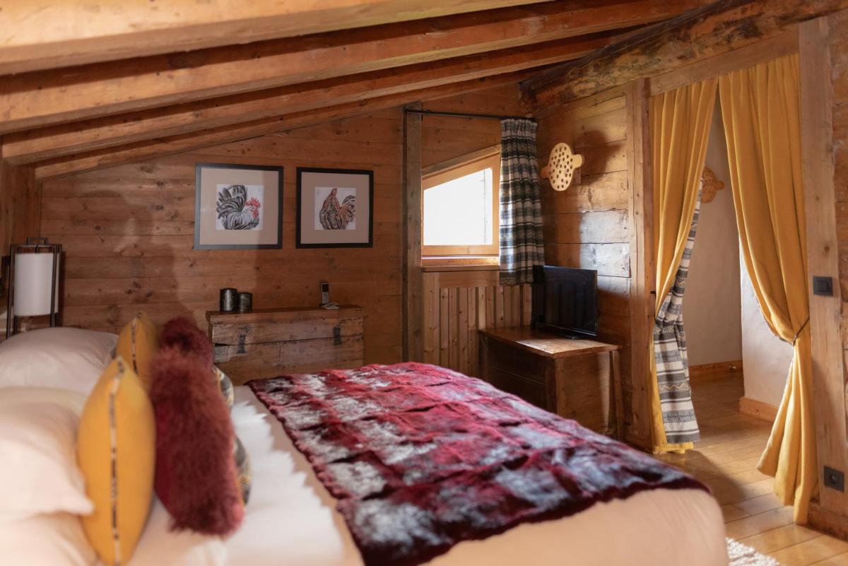 Un ou plusieurs lits dans un hébergement de l'établissement Les Fermes de Marie