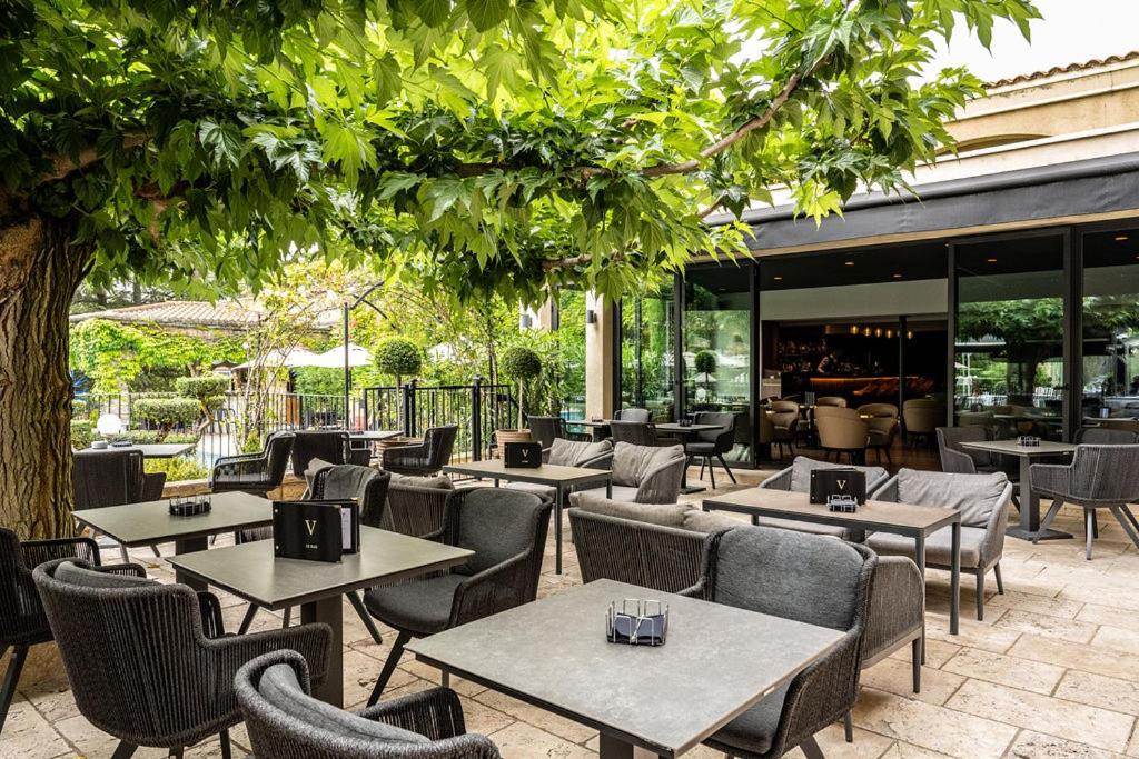 Restaurant ou autre lieu de restauration dans l'établissement Le Vallon de Valrugues Hotel Spa & Villas
