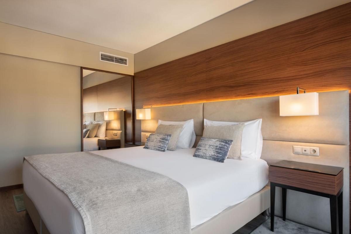 Uma cama ou camas num quarto em Exe São Lázaro