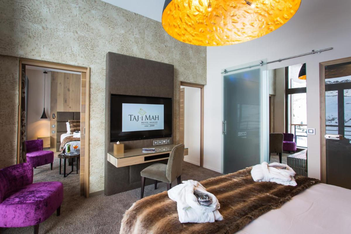 Un ou plusieurs lits dans un hébergement de l'établissement Hôtel Taj-I Mah by Les Etincelles