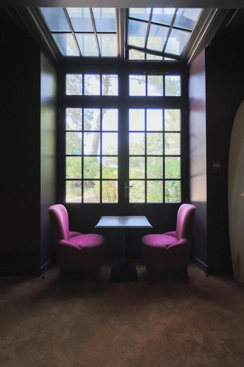 Coin salon dans l'établissement Hôtel Ville d'Hiver