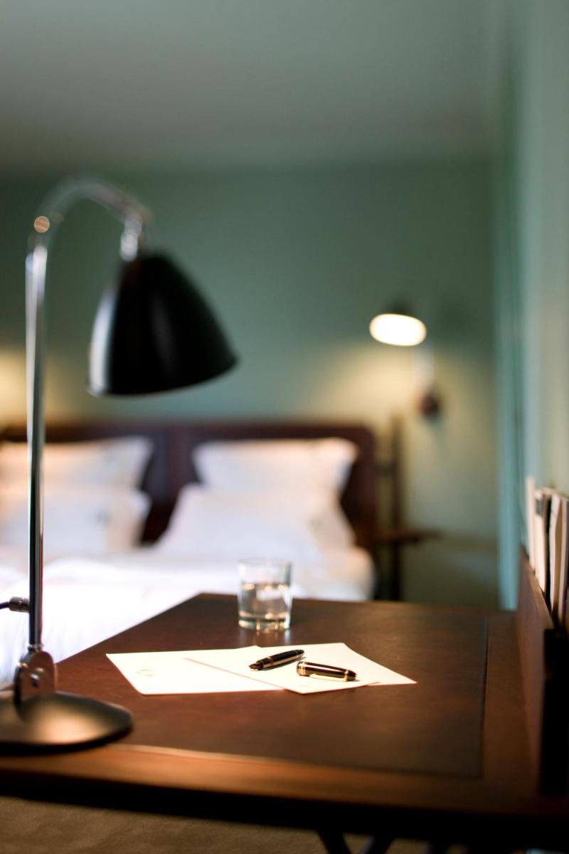 Un ou plusieurs lits dans un hébergement de l'établissement Hôtel Ville d'Hiver