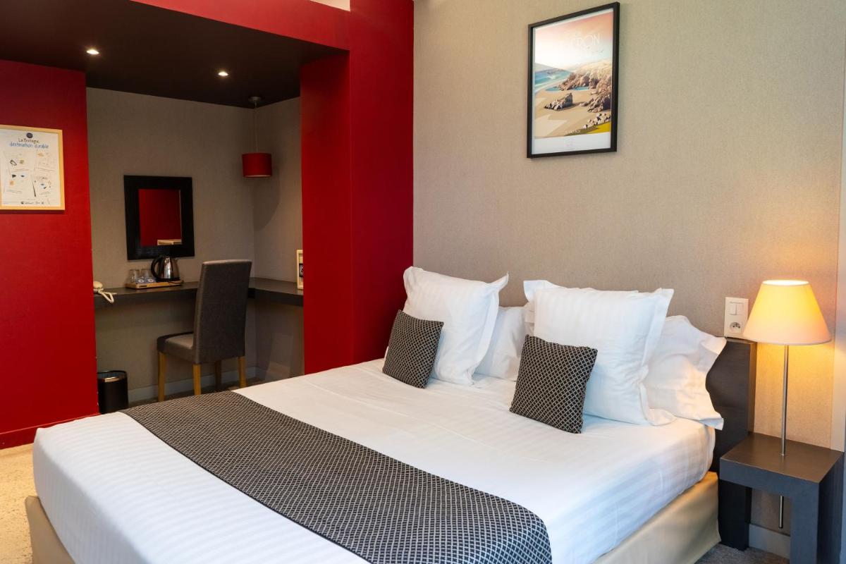 Un ou plusieurs lits dans un hébergement de l'établissement Le Galet Hotel & Spa