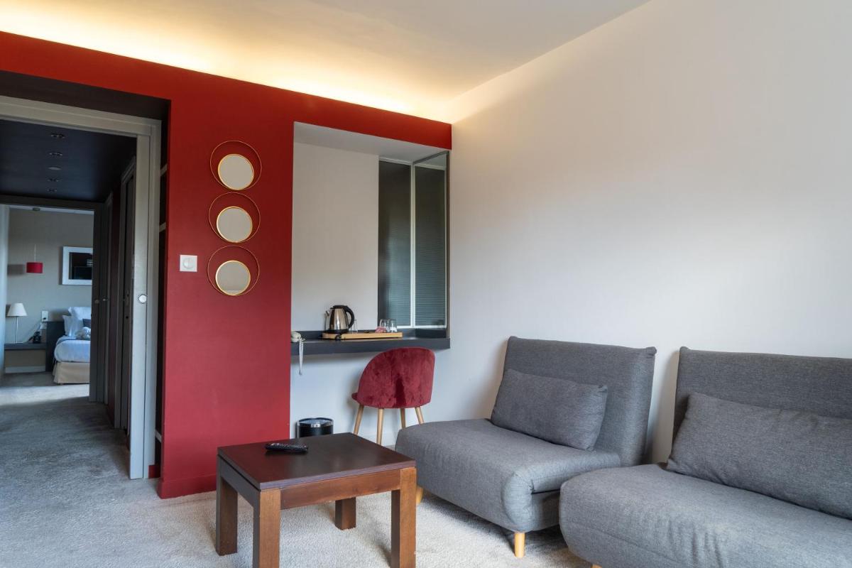 Coin salon dans l'établissement Le Galet Hotel & Spa