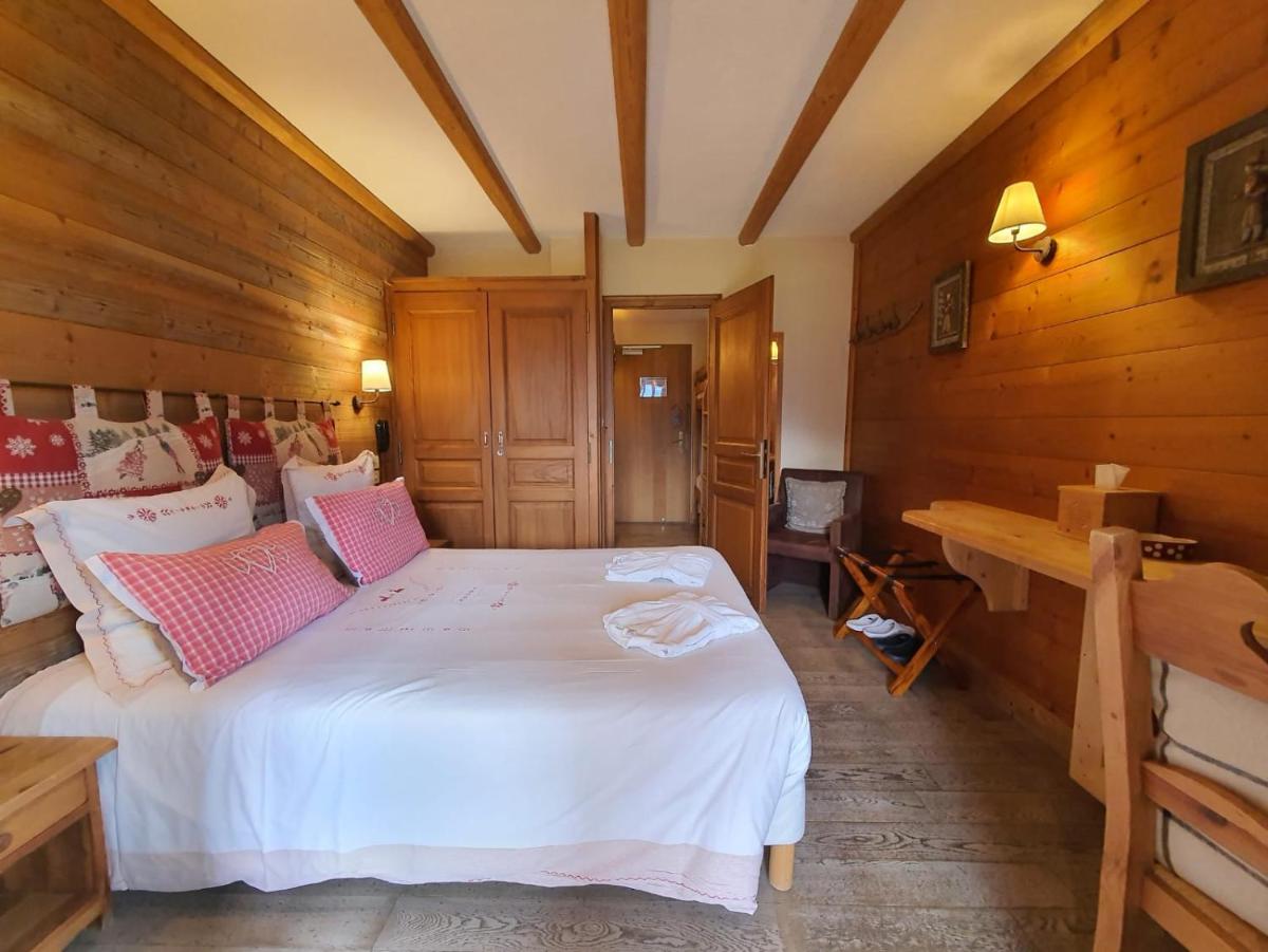Un ou plusieurs lits dans un hébergement de l'établissement Café-Hôtel Le Morillon, Domaine du Grand Massif-Samoëns