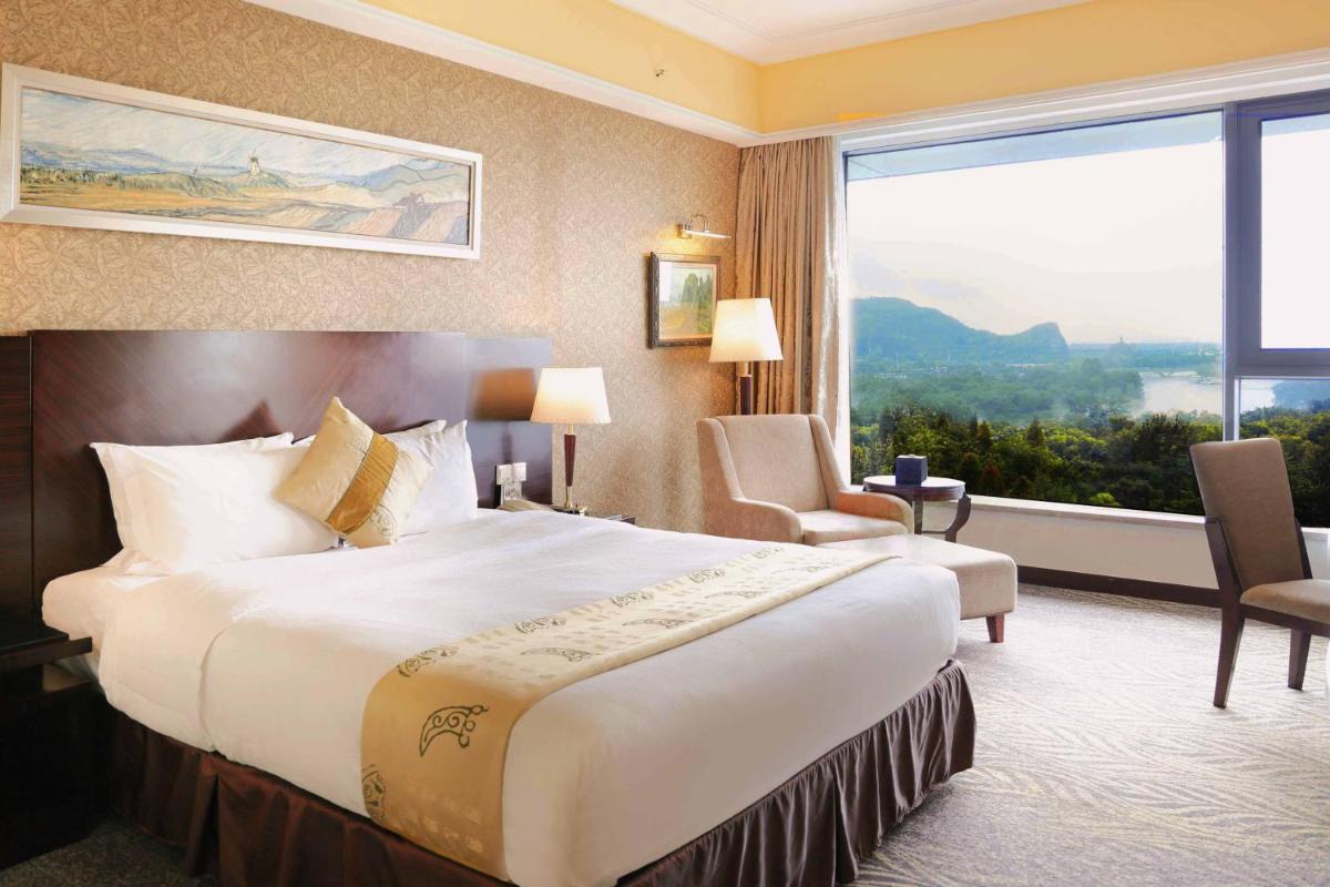 Lijiang Waterfall Hotel Guilin - Housity