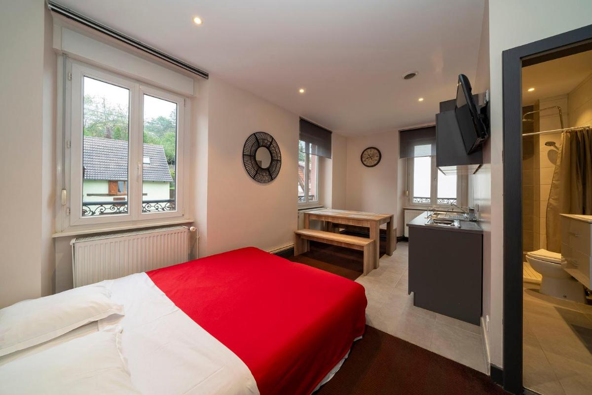 Un ou plusieurs lits dans un hébergement de l'établissement Hôtel du Parc, Restaurant, Spa & Wellness