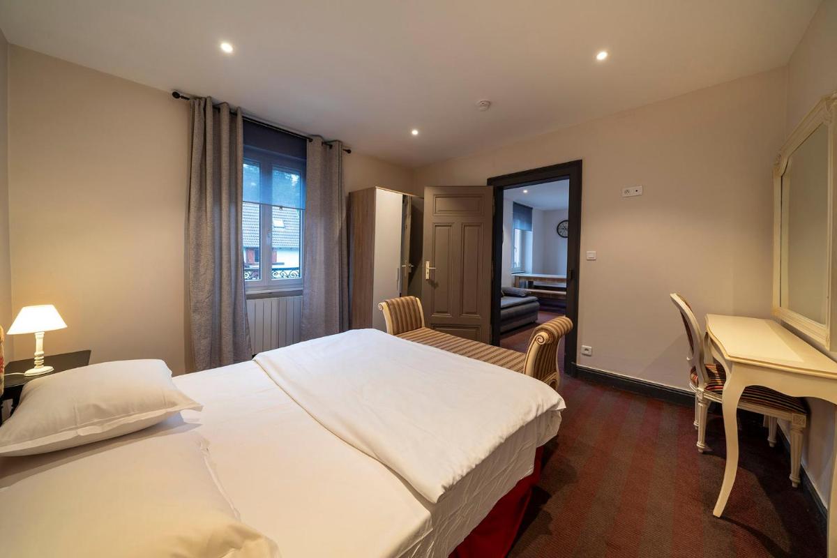 Un ou plusieurs lits dans un hébergement de l'établissement Hôtel du Parc, Restaurant, Spa & Wellness