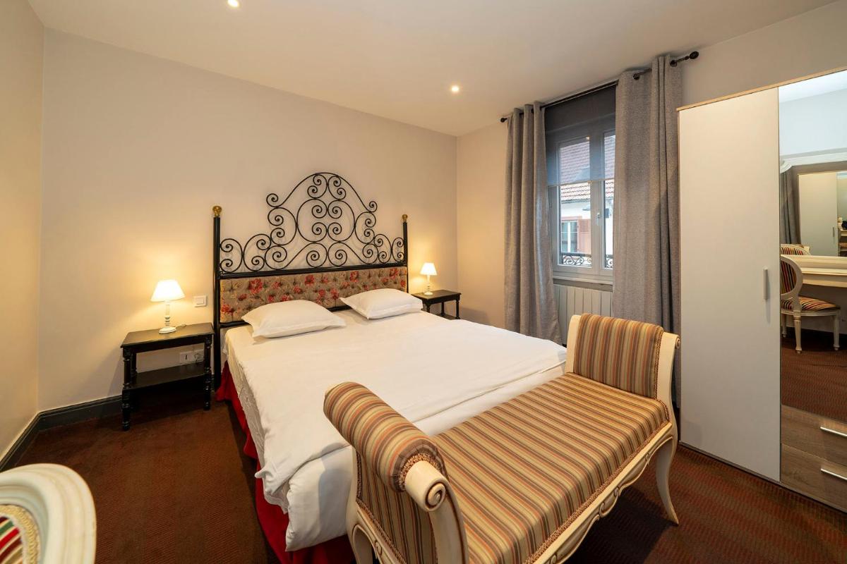 Un ou plusieurs lits dans un hébergement de l'établissement Hôtel du Parc, Restaurant, Spa & Wellness