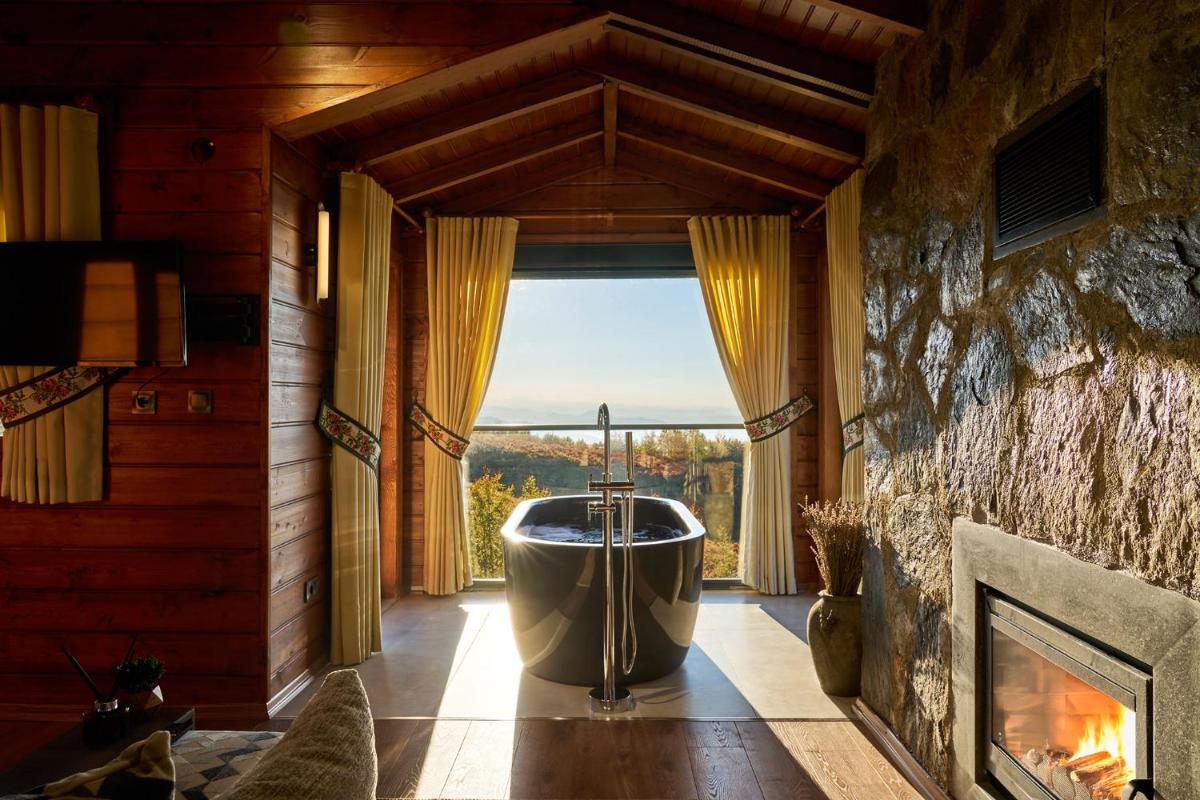 Flora Handüzü Resort & Wellness Bungalow Hotel - Housity