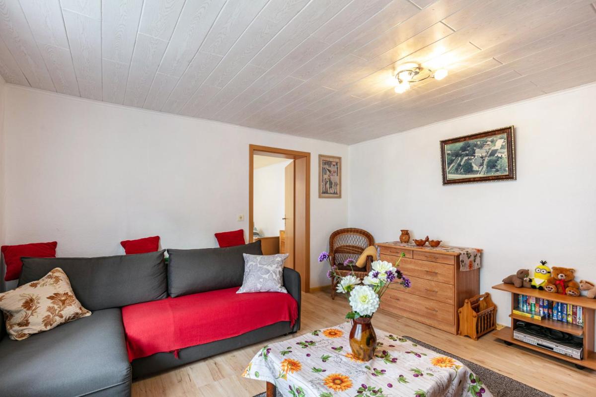 Ferienwohnung im Blumengarten - Housity