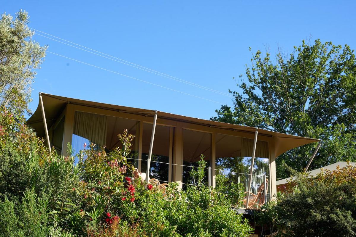 Um jardim no exterior de Carmo's Boutique Hotel - Small Luxury Hotels of the World