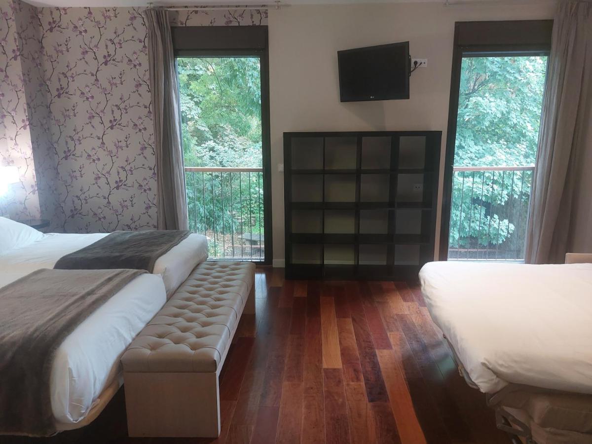 Cama o camas de una habitación en U-Hotel Spa Ciudad de Astorga