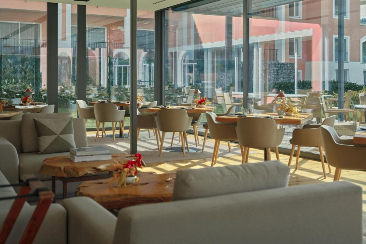 Um restaurante ou outro lugar para comer em Penha Longa Resort