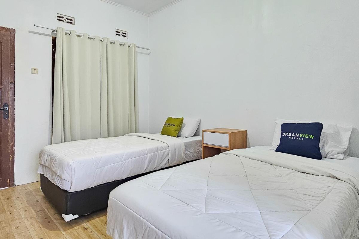 Urbanview Orchid Guest House - Housity