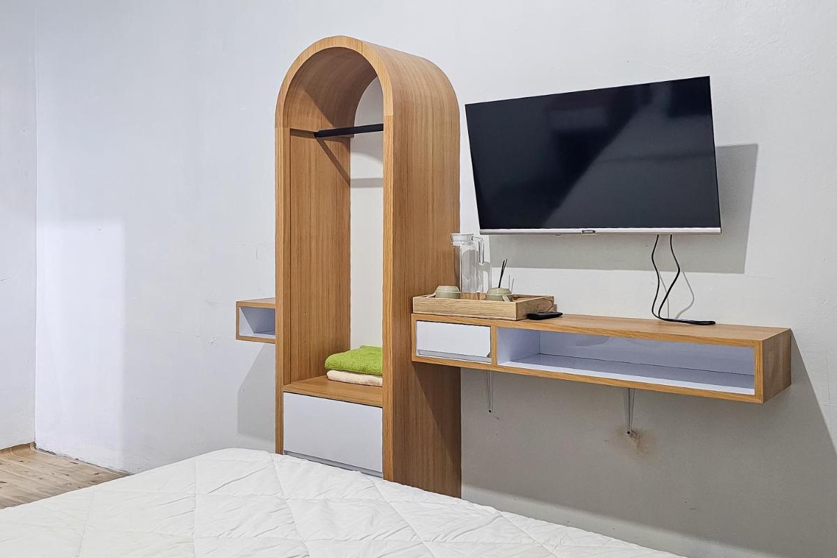 Urbanview Orchid Guest House - Housity