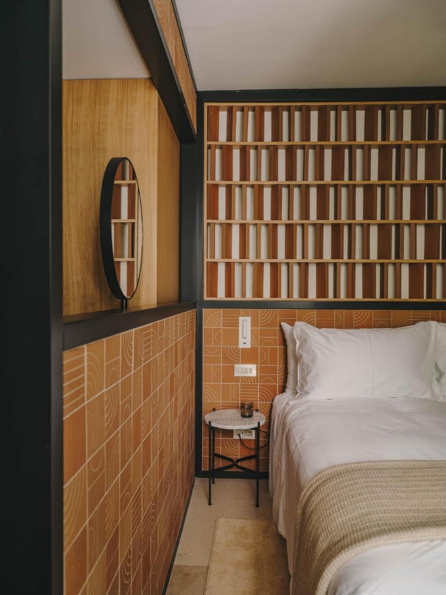 Cama o camas de una habitación en Hotel Palau Fugit