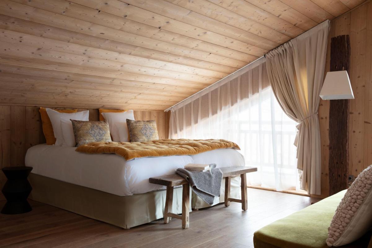 Un ou plusieurs lits dans un hébergement de l'établissement Grandes Rousses Hotel & Spa