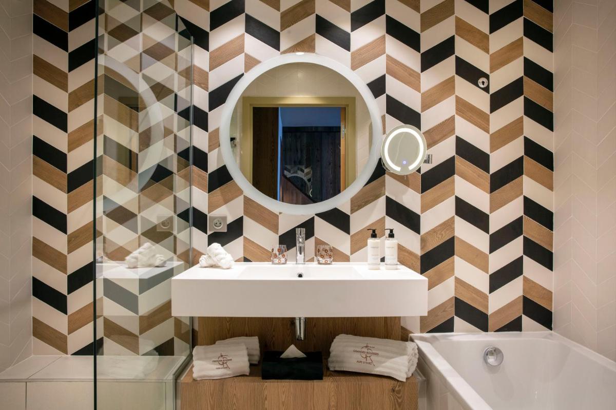 Salle de bains dans l'établissement Grandes Rousses Hotel & Spa