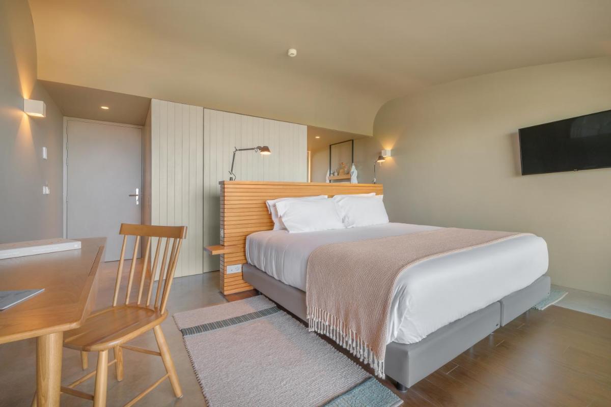 Uma cama ou camas num quarto em Immerso Hotel, a Member of Design Hotels