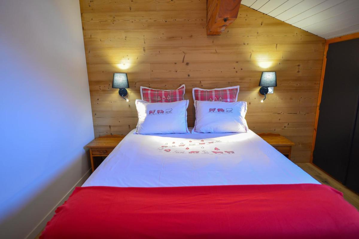Un ou plusieurs lits dans un hébergement de l'établissement Café-Hôtel Le Morillon, Domaine du Grand Massif-Samoëns