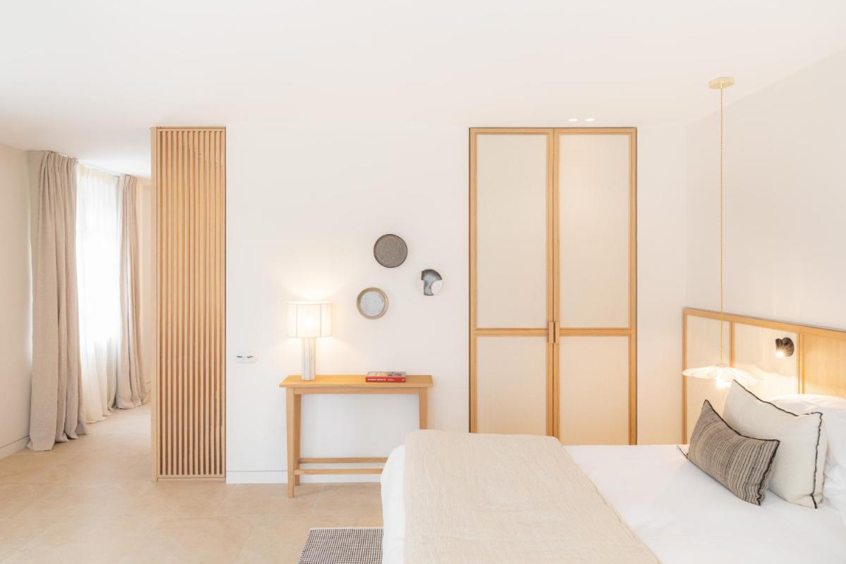 Un ou plusieurs lits dans un hébergement de l'établissement Le Couvent des Minimes, un Hôtel & Spa L'Occitane en Provence