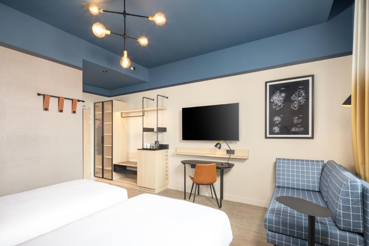 Un ou plusieurs lits dans un hébergement de l'établissement Hyatt Place Rouen
