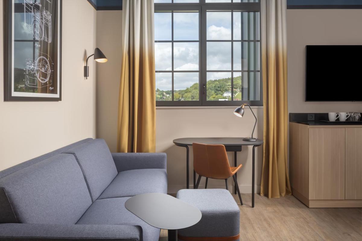 Télévision ou salle de divertissement dans l'établissement Hyatt Place Rouen