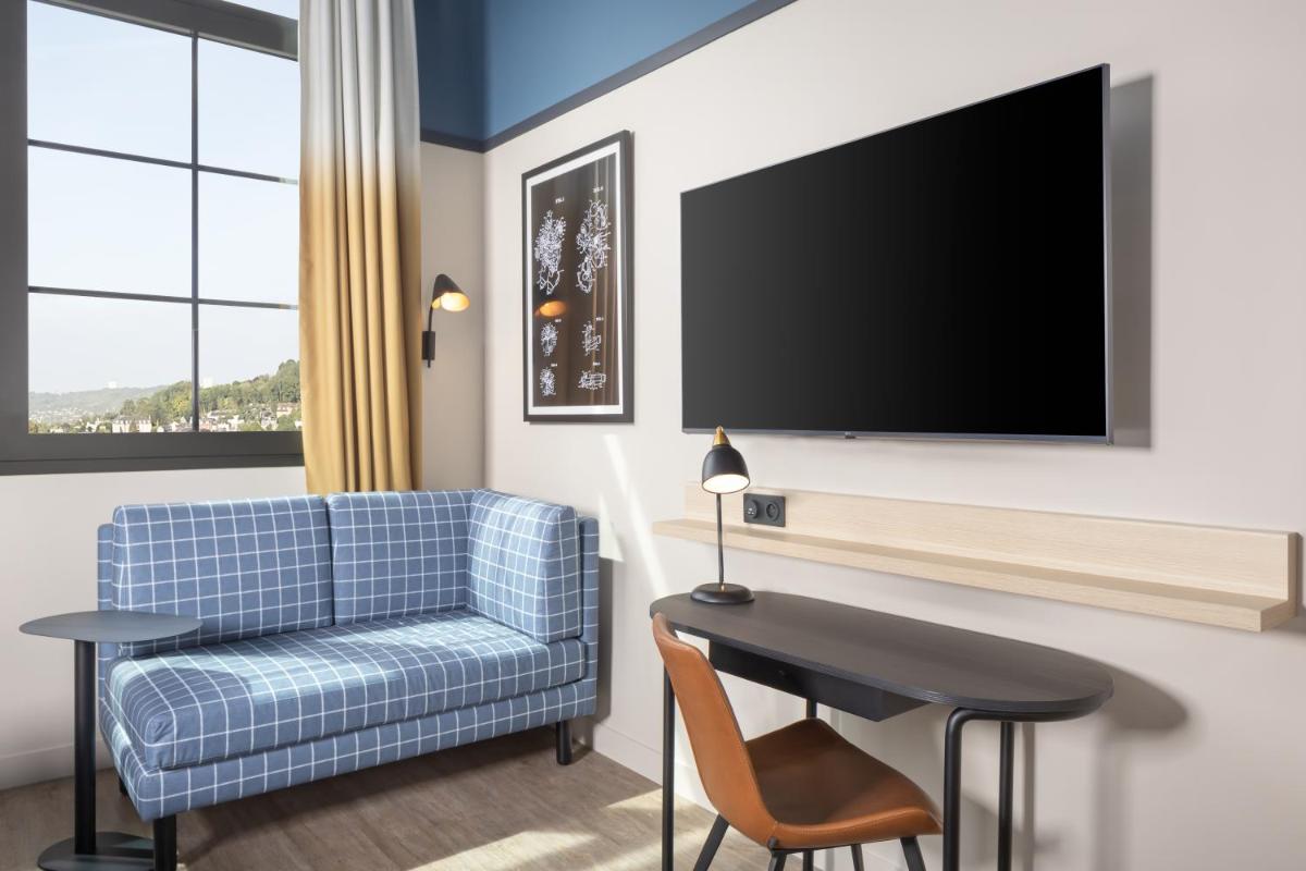 Télévision ou salle de divertissement dans l'établissement Hyatt Place Rouen