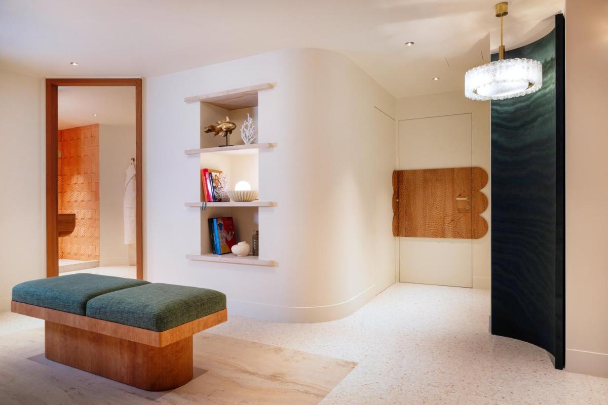 Un ou plusieurs lits dans un hébergement de l'établissement Hotel Montalembert