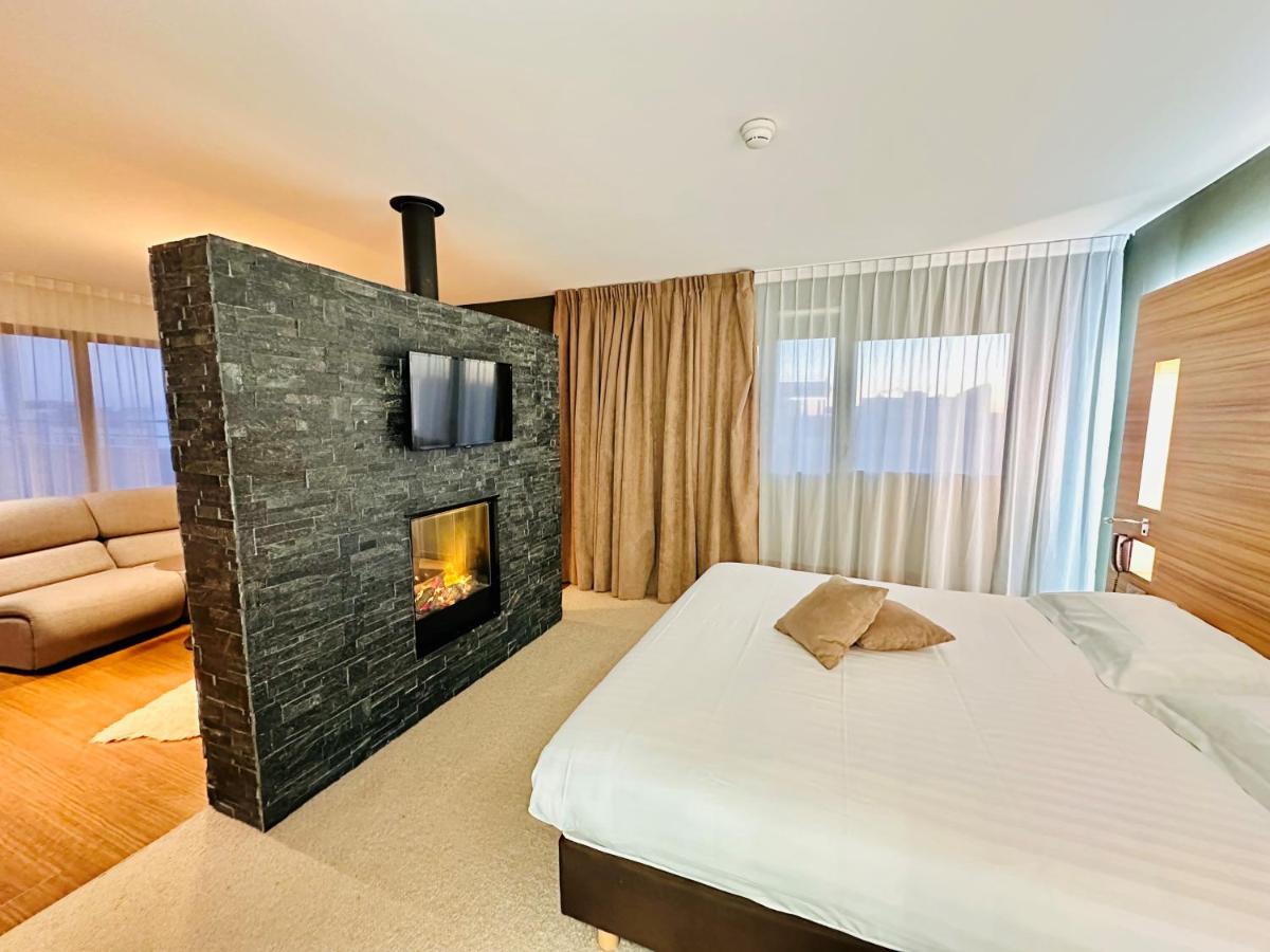 Un ou plusieurs lits dans un hébergement de l'établissement Brit Hotel & Spa Saint Brieuc Plérin