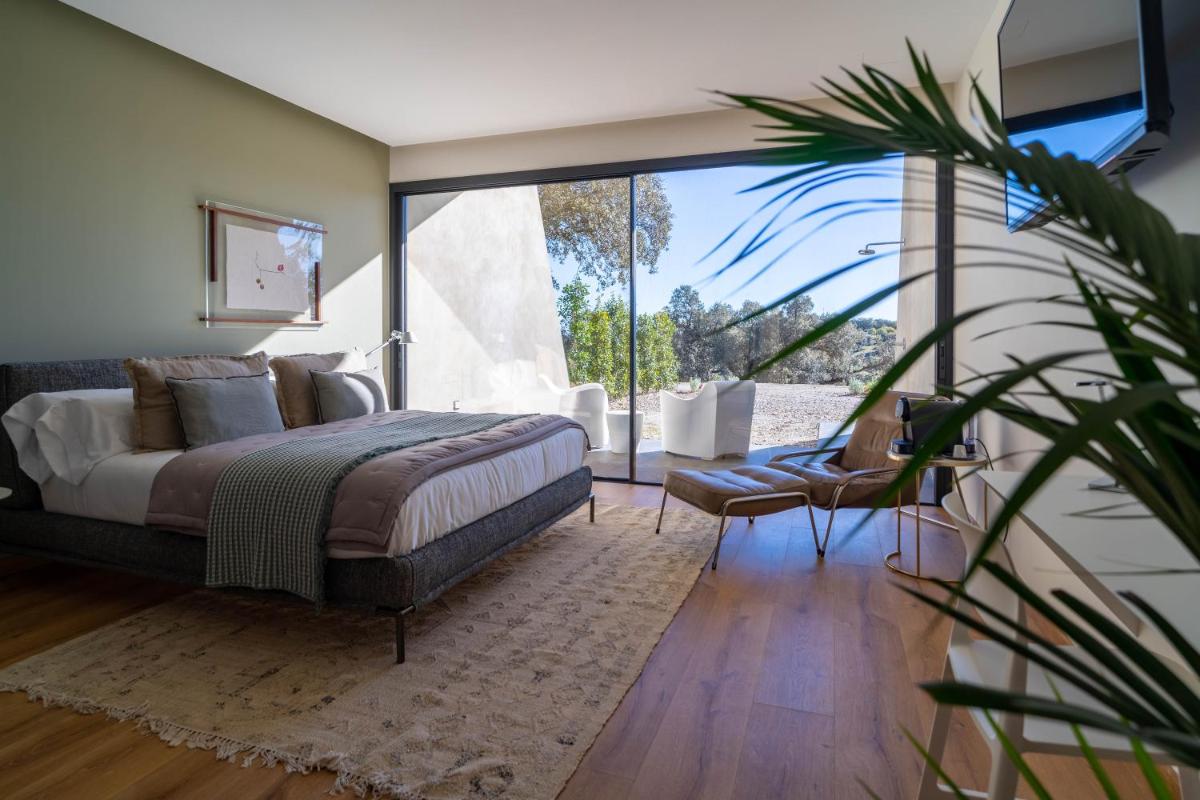 Cama o camas de una habitación en Hoteles Desconecta2