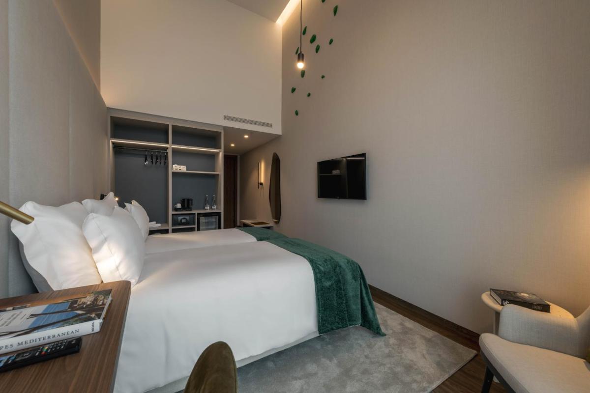 Uma cama ou camas num quarto em Dolinas Climbing Hotel