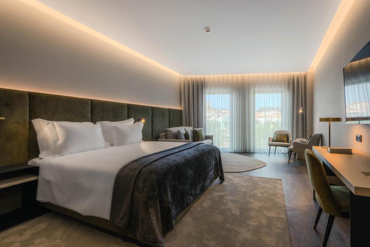 Uma cama ou camas num quarto em Dolinas Climbing Hotel