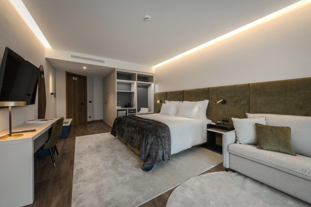 Uma cama ou camas num quarto em Dolinas Climbing Hotel