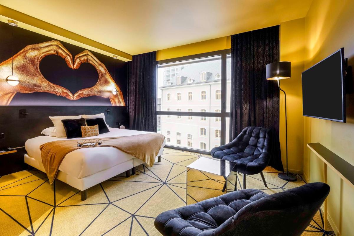 Un ou plusieurs lits dans un hébergement de l'établissement Hotel Leprince, Best Western Premier Collection