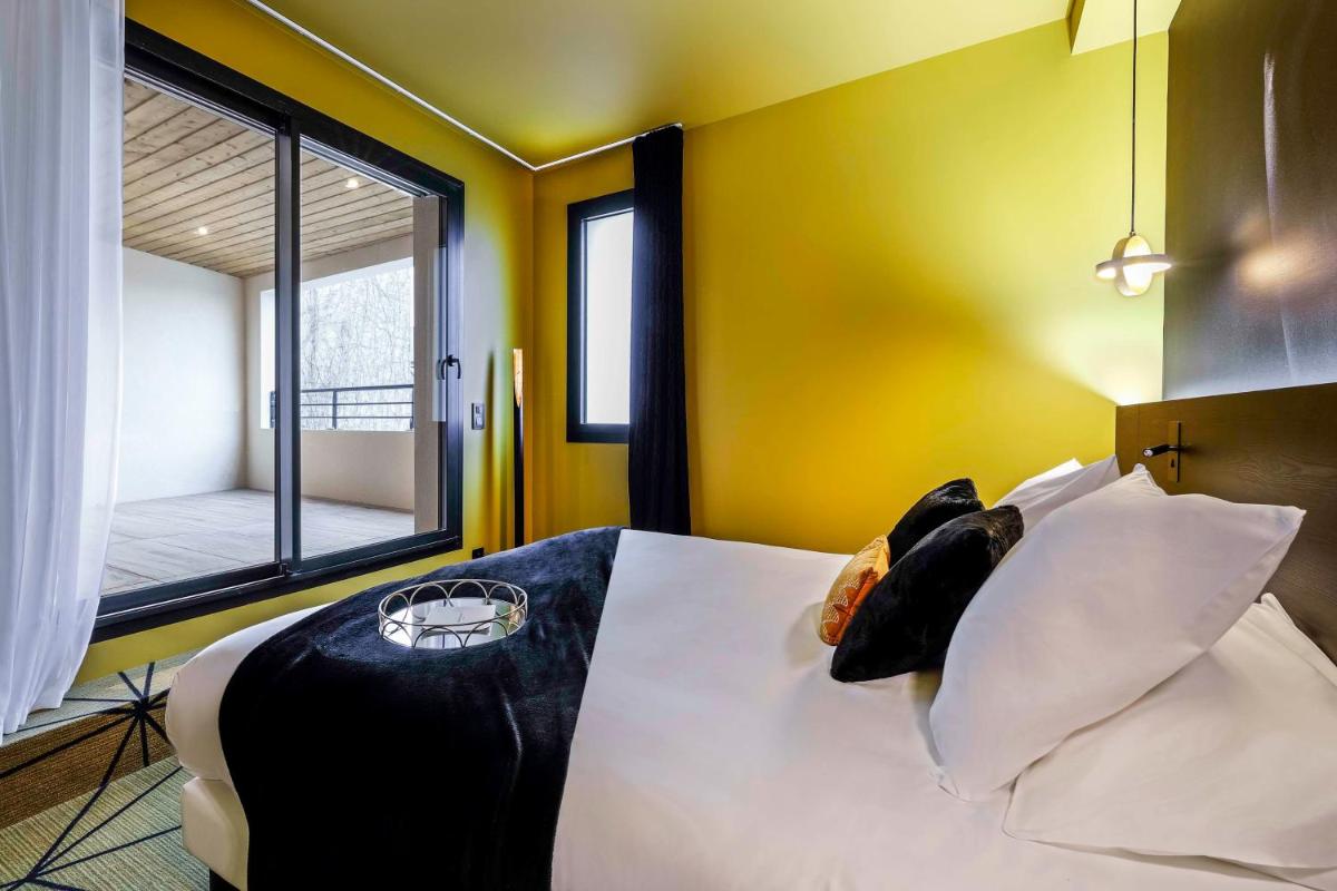 Un ou plusieurs lits dans un hébergement de l'établissement Hotel Leprince, Best Western Premier Collection